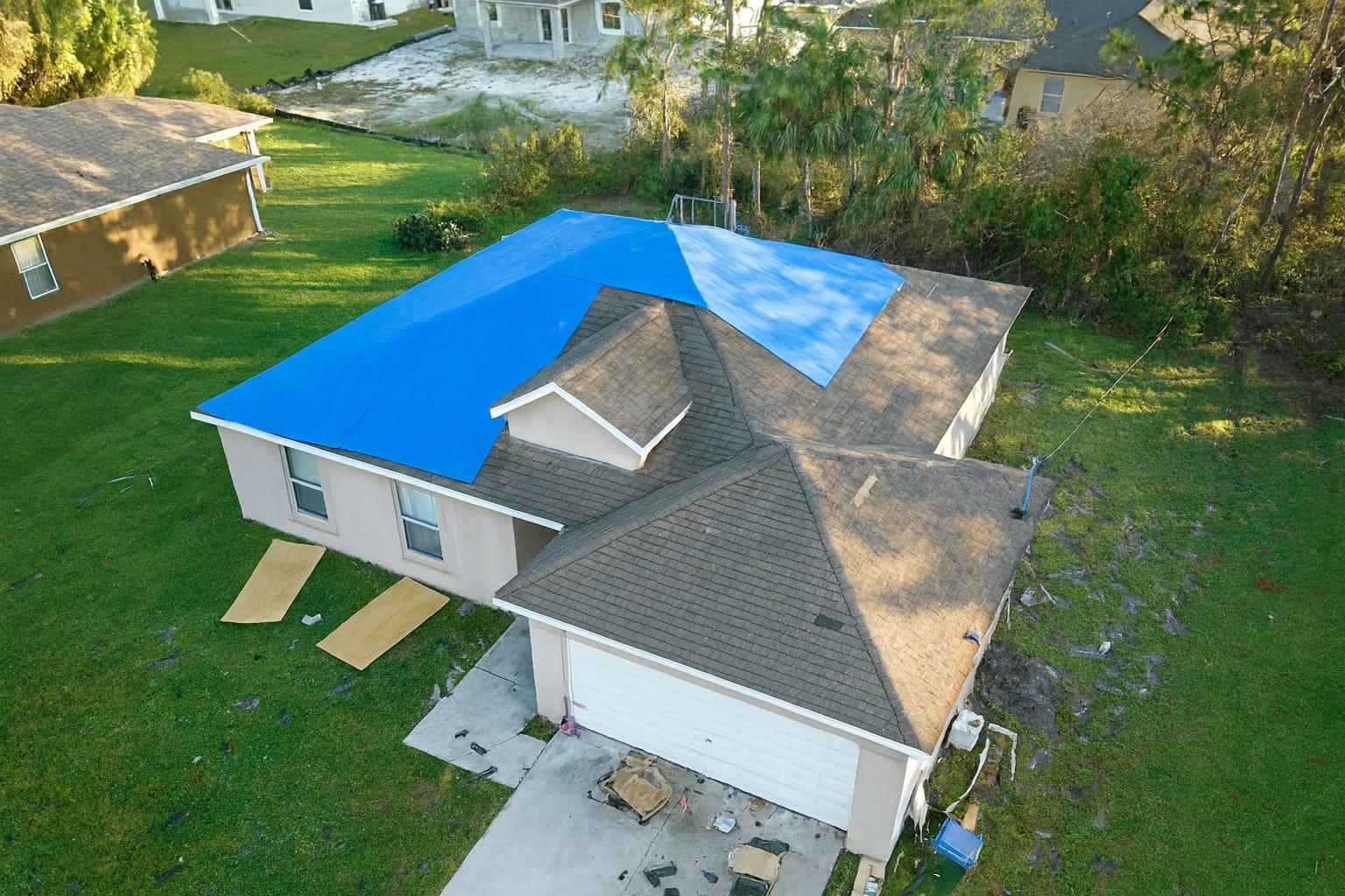Shingles and siding damaged by strong winds