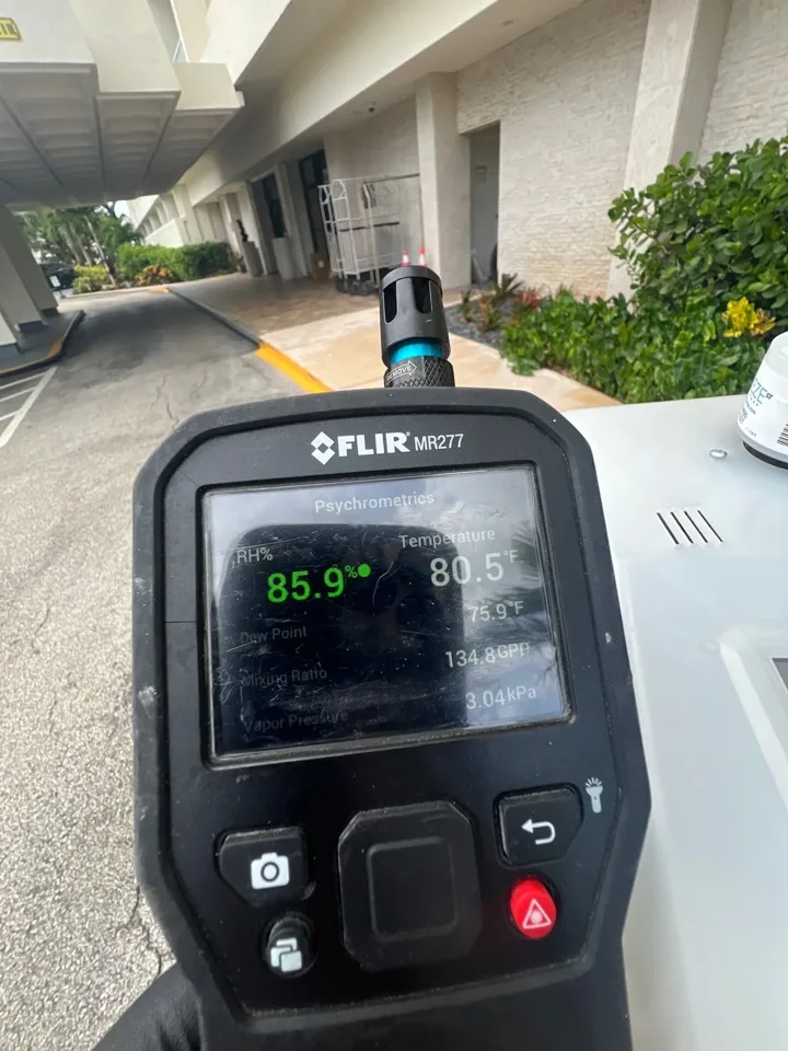 Environmental instrument displaying a reading outside a property.